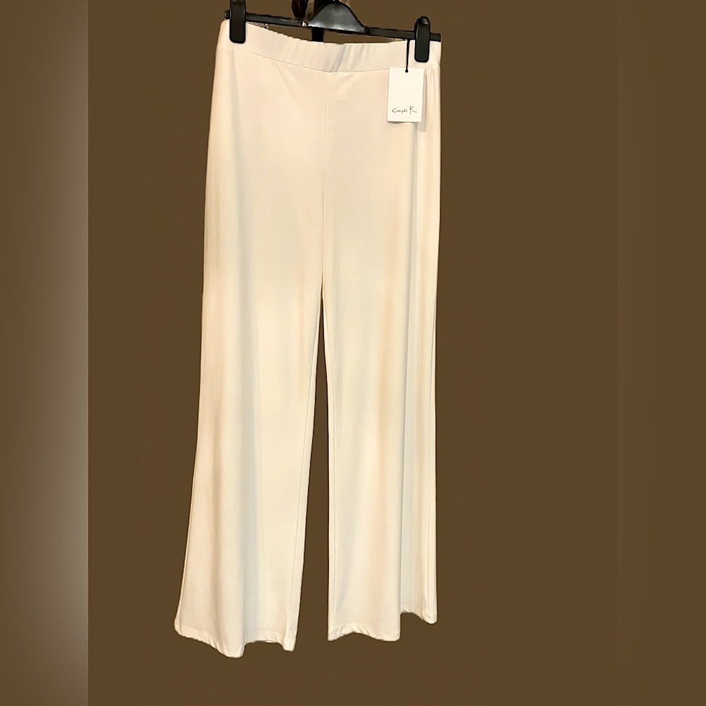 Off White , wide flowing legs.